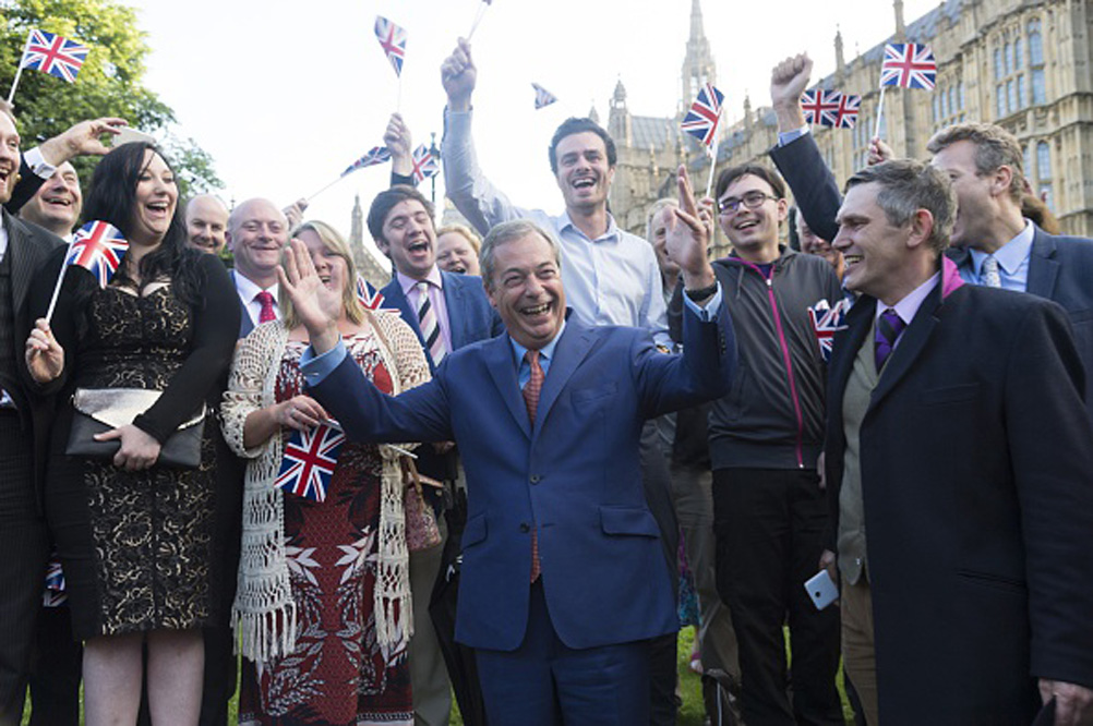 UKIP party leader Nigel Farage greets supporters before a press conference in Westminster after British people voted in the British EU Referendum to leave the European Union in London, United Kingdom on June 24, 2016. Photo: Ray Tang/Anadolu Agency/Getty Images.