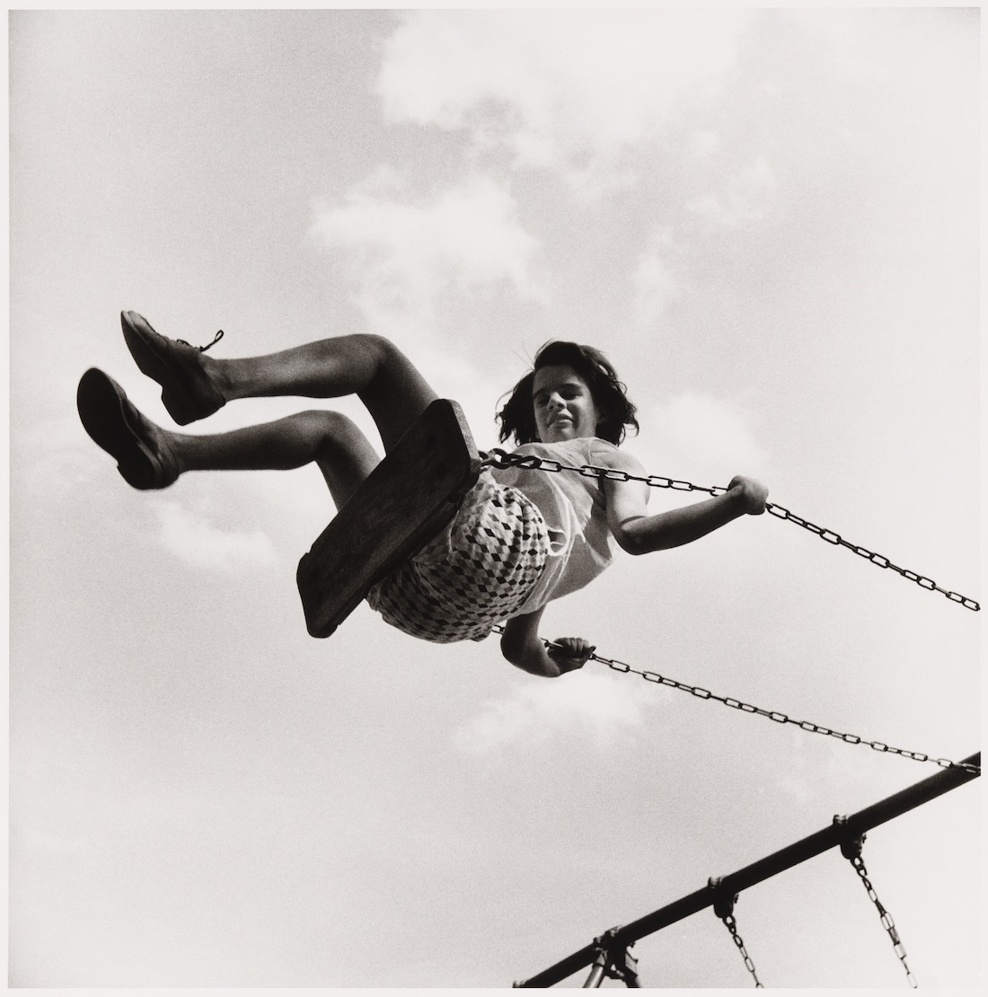 Peter-Hujar-Girl-on-Swing-Southbury-1957-Courtesy-The-Ukrainian-Museum-New-York-2-May-1-September-2024-©-The-Peter-Hujar-Archive-Artists-Rights-Society-ARS-NY